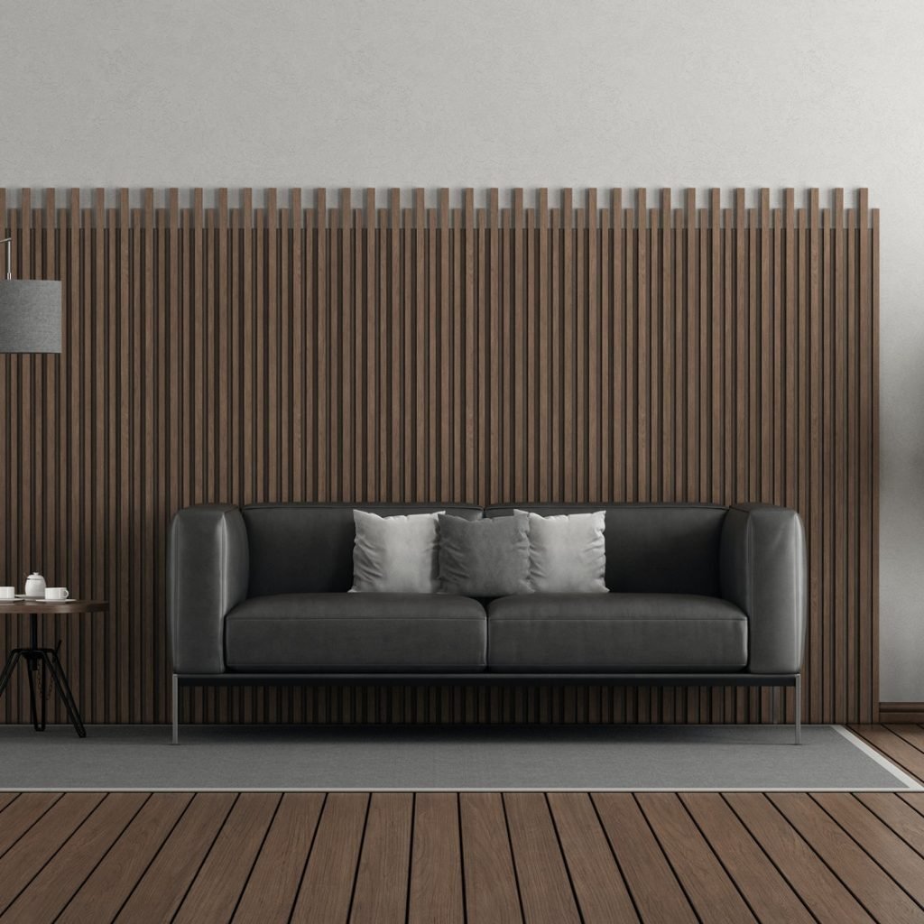 modern-living-room-with-black-leather-sofa-in-front-of-a-wooden-panel.jpg